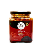 Jar of Umma's Pickles Puliyunchi on a white background