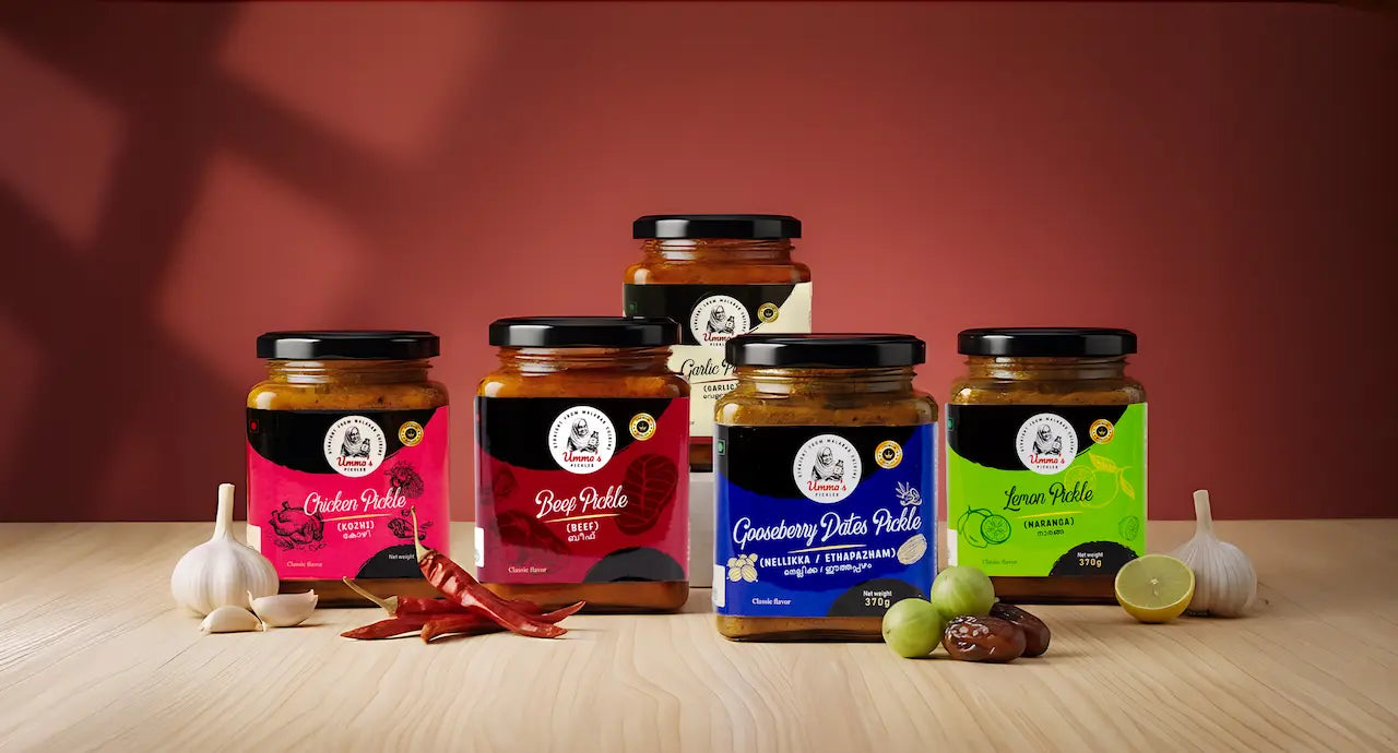 Assorted jars of pickles on a wooden surface with a red background