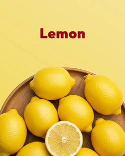 Wooden plate with lemons on a yellow background