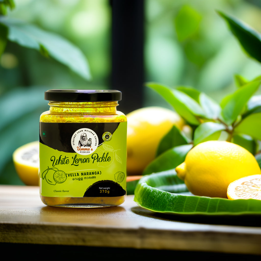 Jar of white lemon pickle with lemons on a wooden surface and green leaves in the background